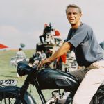Actor Steve McQueen rides a motorcycle in the promotion of the 1963 movie The Great Escape.