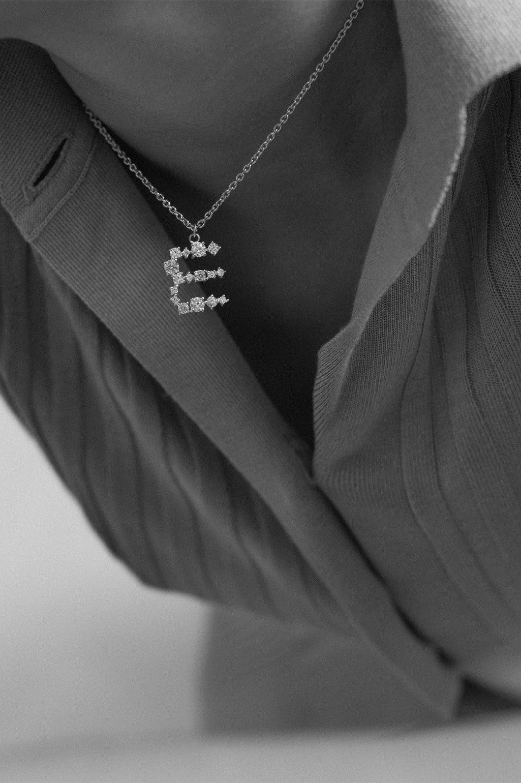 Images may contain jewelry necklace pendants for adults and people