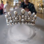 A jewel-encrusted crown in a display case.