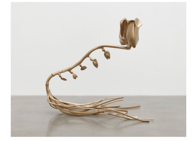 Large bronze flower sculpture with snake-like qualities.