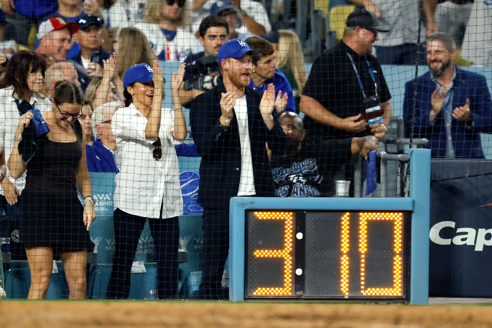 Meghan Markle and Prince Harry attended the Los Angeles Dodgers and Toronto Blue Jays game in Los Angeles on Tuesday night.