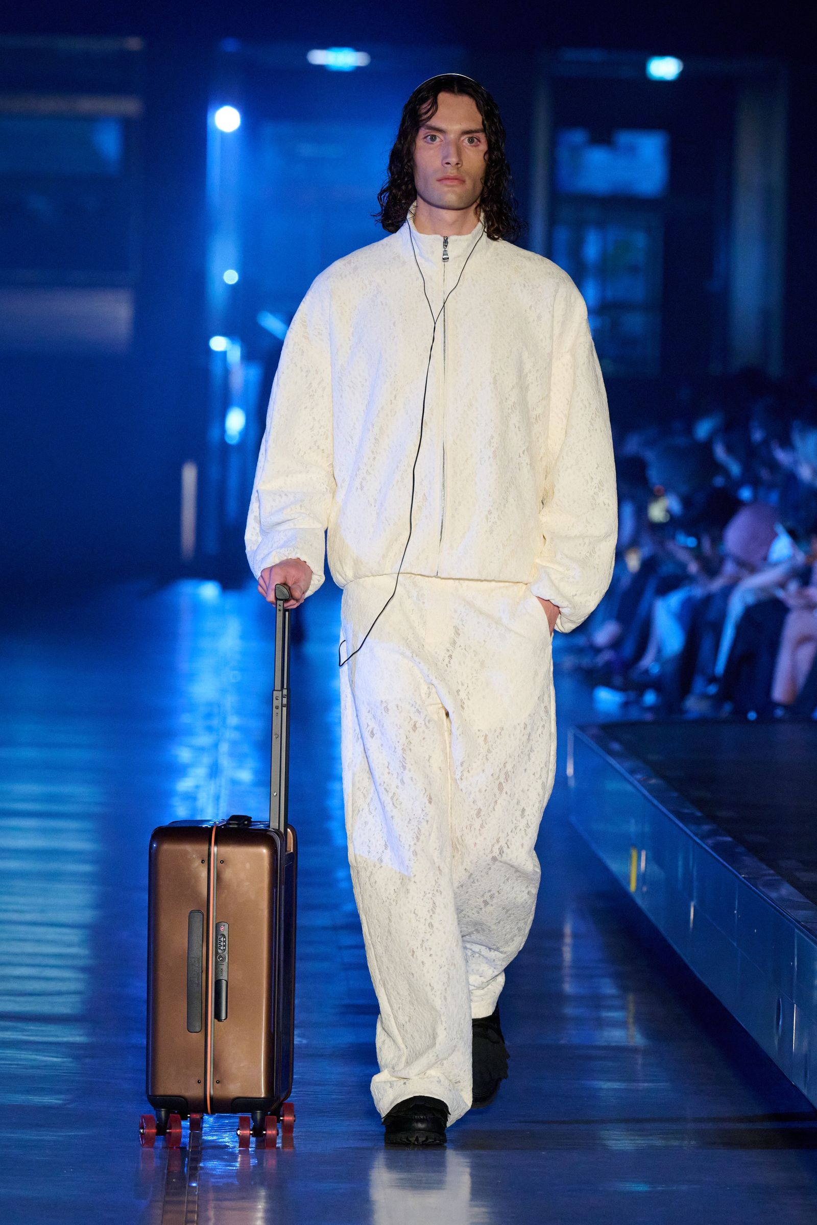 Image may contain adults, clothing, footwear, shoes and luggage