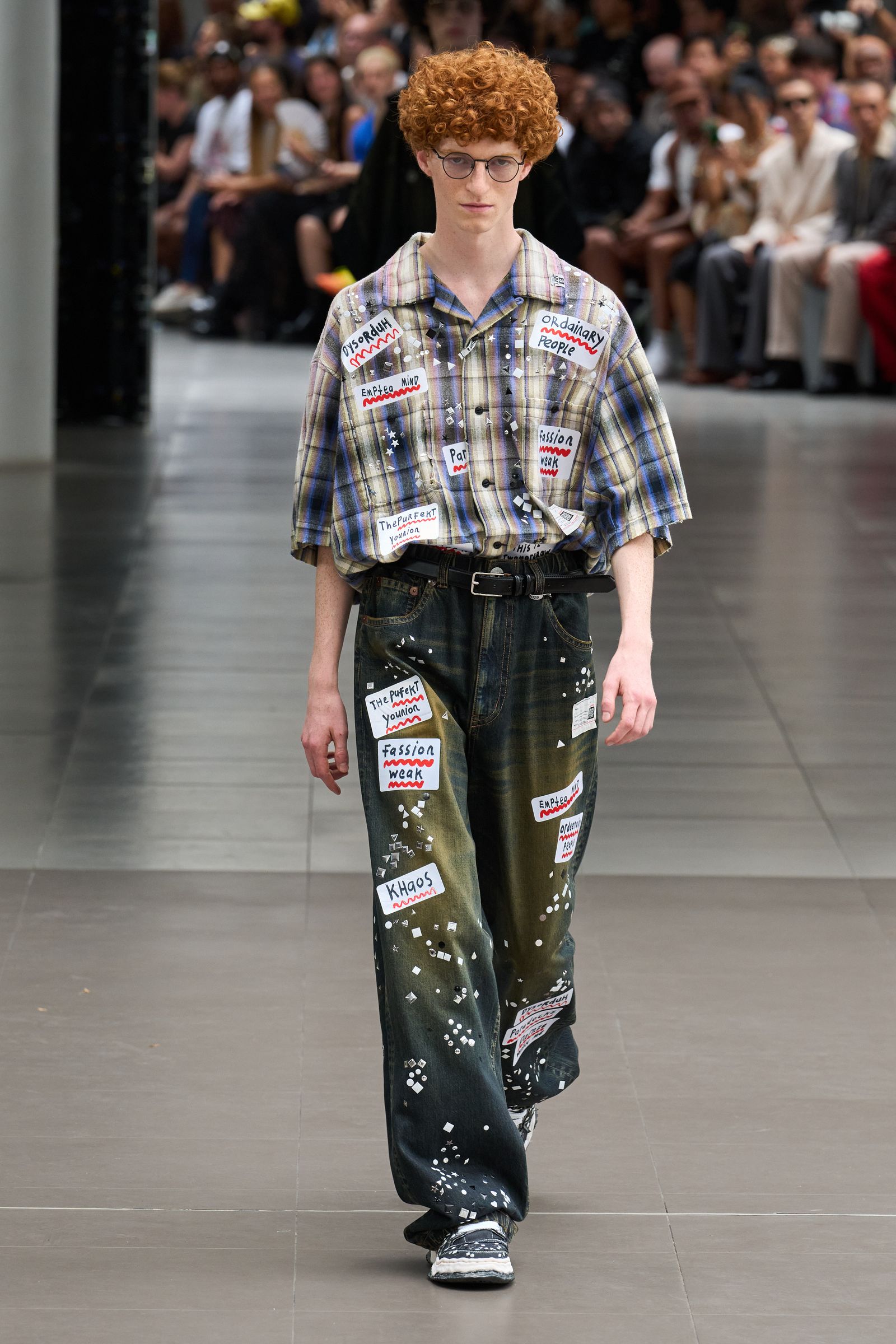 Image may contain Bill Bergey clothing, pants, accessories, eyewear, teen fashion footwear, shoes and jeans