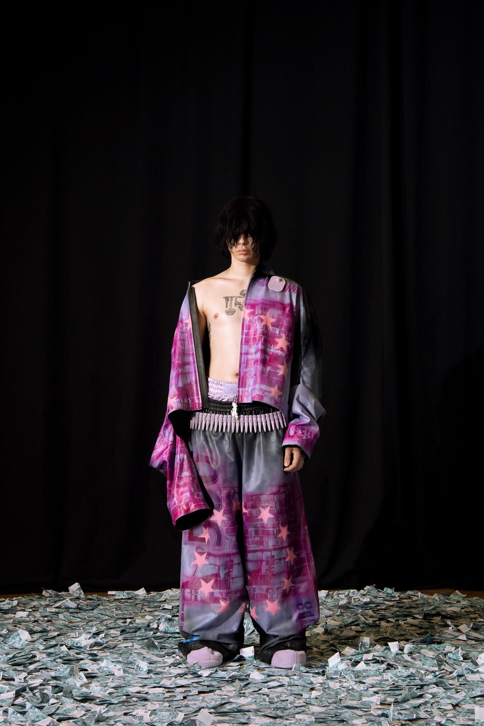 Image may contain Zim Zum fashion apparel, dress, performer solo performance shoes, shoes and standing