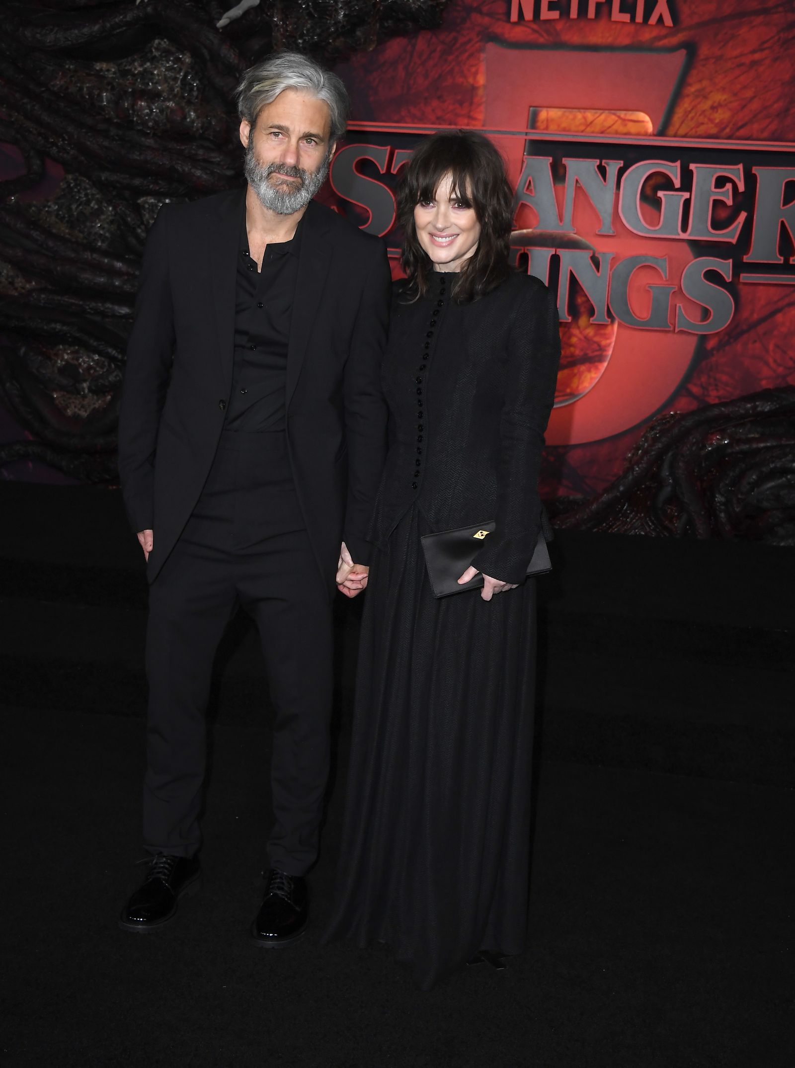 Scott Mackinlay Hahn and Winona Ryder arrive at the Netflix Los Angeles premiere on November 6 in Hollywood, CA…