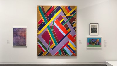 An abstract painting composed of multihued frames in a row that are split open by green and orange lines.