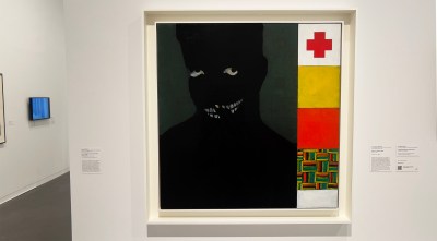A black figure against a black background beside four abstract images.