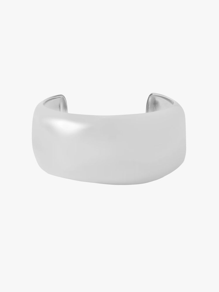 Image may contain: cuffs, accessories, bracelet and jewelry