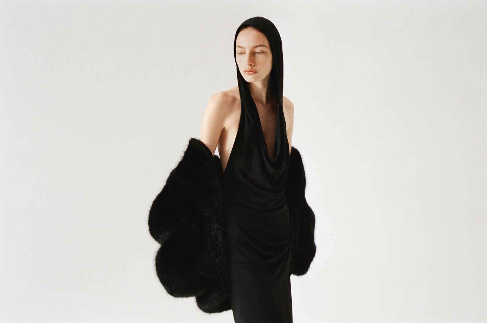 Images may contain adults, clothing, gloves, fashionable coats, faces, head photography and portraits