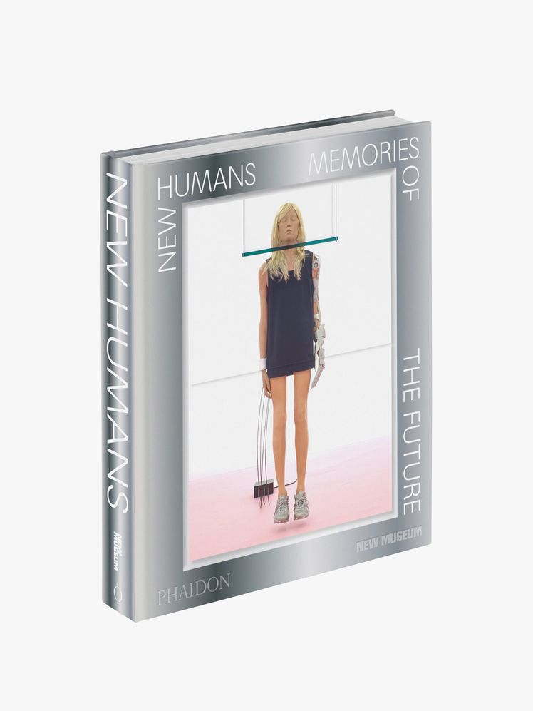 Image may contain: book, publication, people, teenager, electronics, screen, computer hardware, hardware and monitor