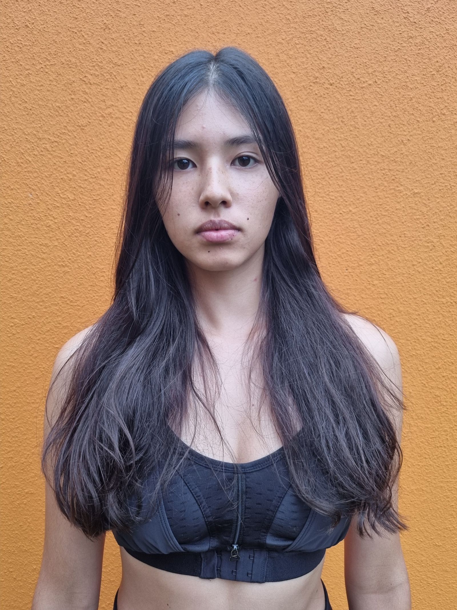 Image may contain black hair, hair, adult faces and heads