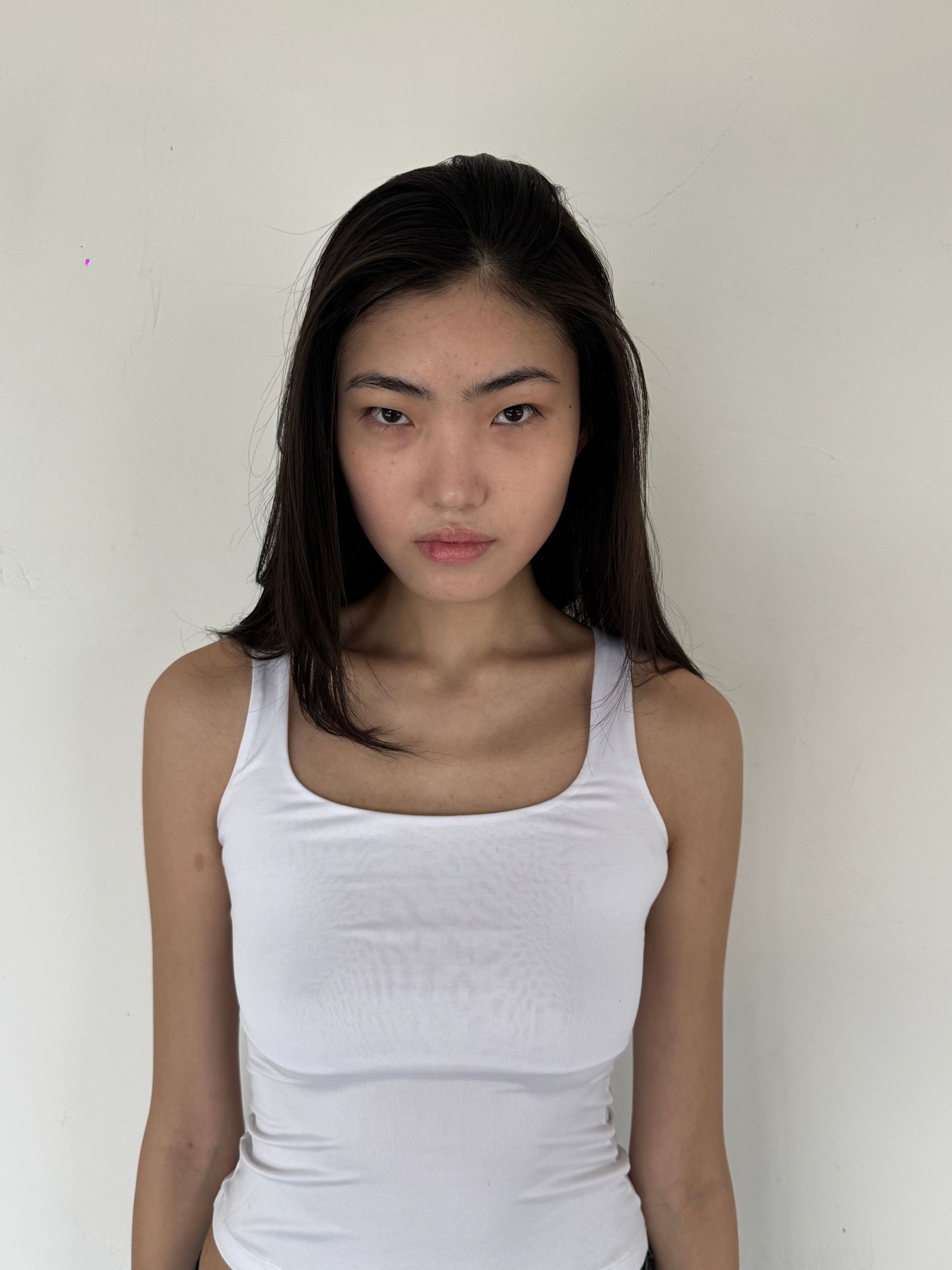 Images may contain headshots, face photography, portraits, body parts, necks, adult clothing and tank tops