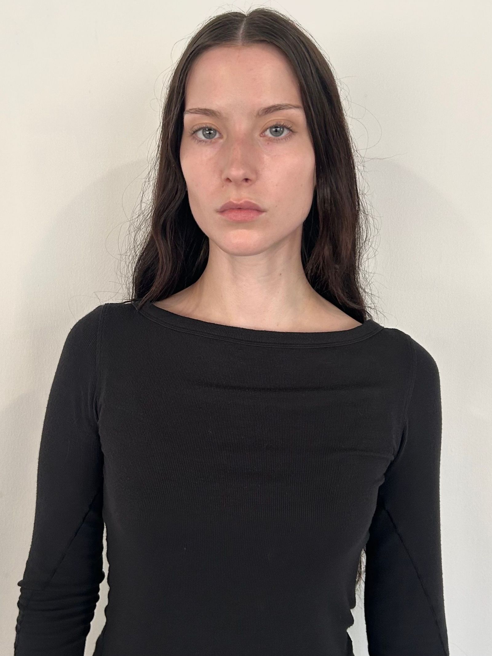 Image may contain body parts, face, head, neck, people photography, portraits, clothing, long sleeves and adults