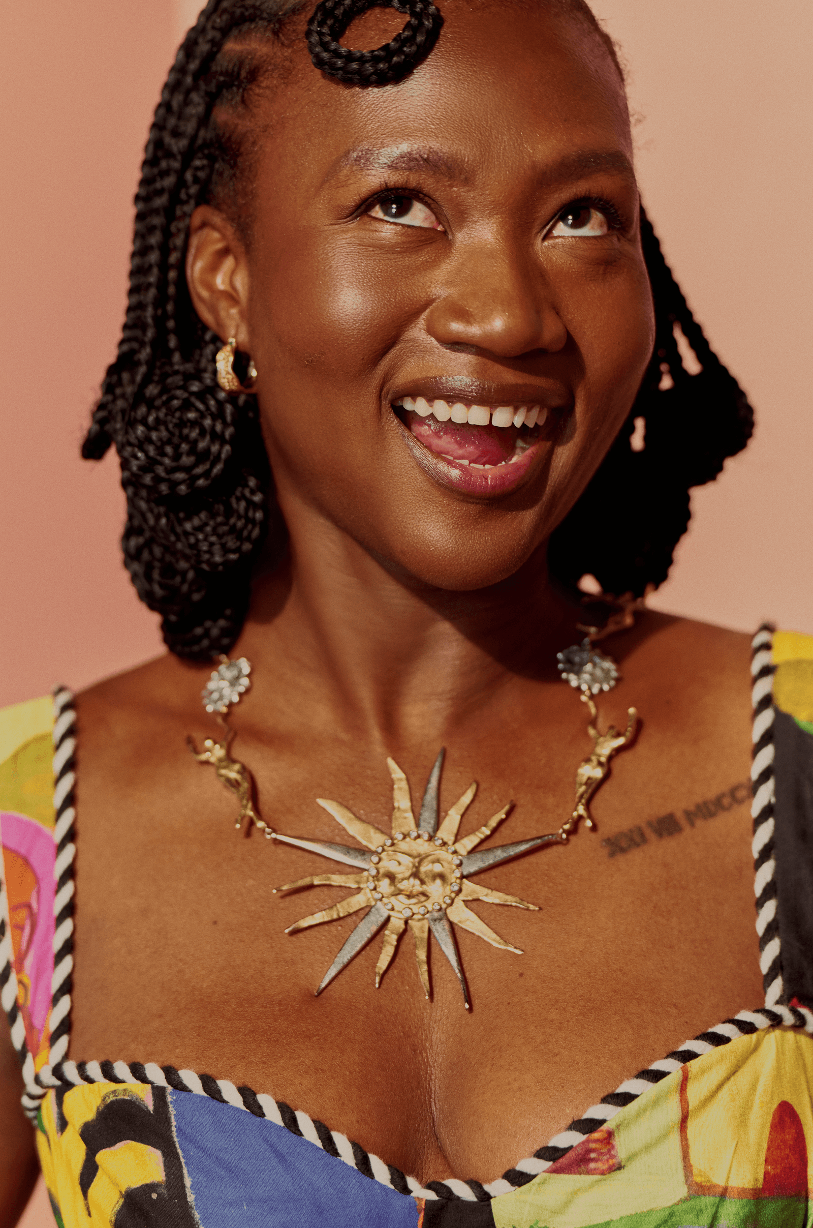 Image may contain head, face, body parts, neck, happy smile, accessories, jewelry, necklace, adult and wedding