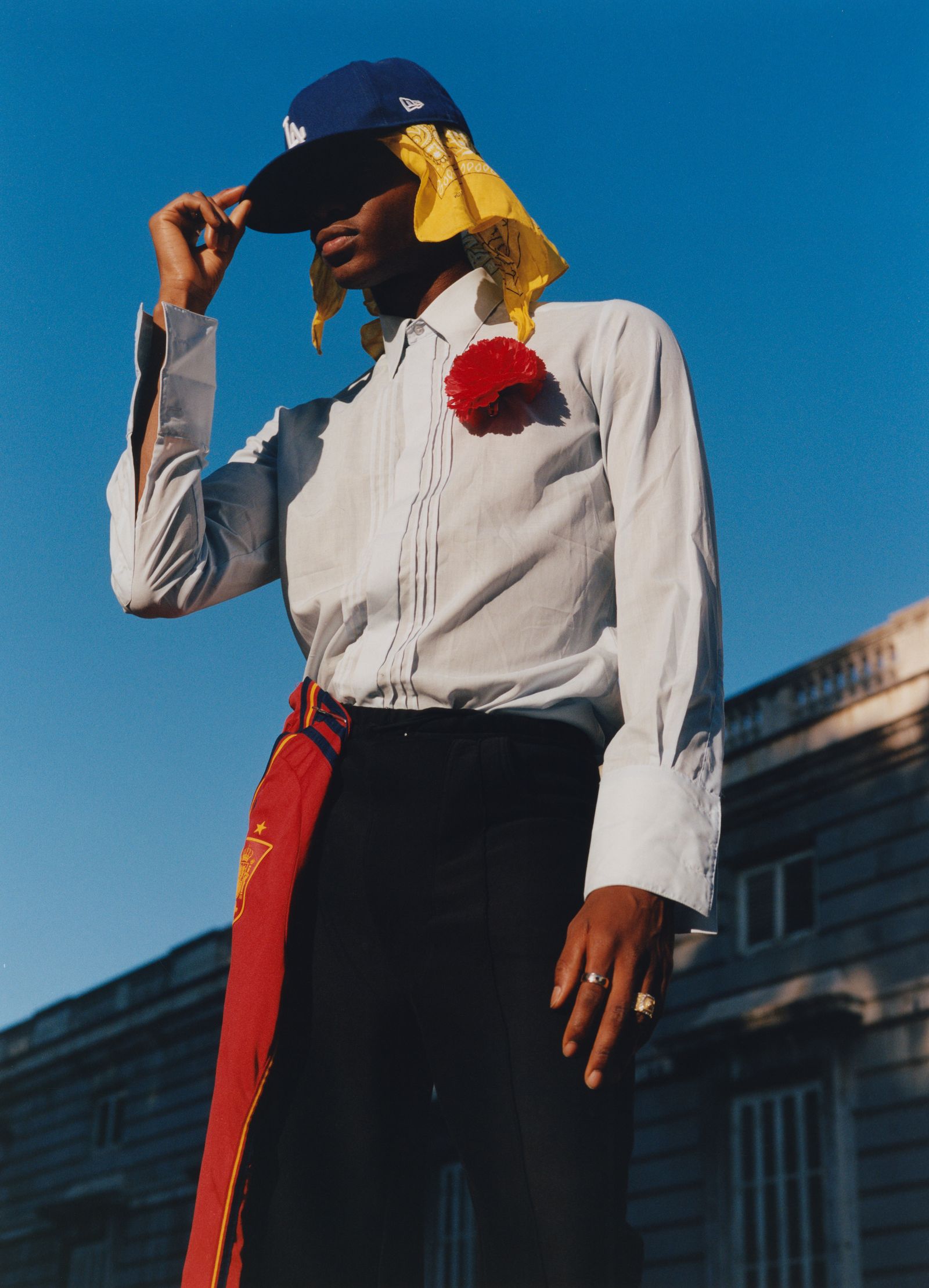 Image may contain baseball caps, hats, clothing, people, adult faces and heads