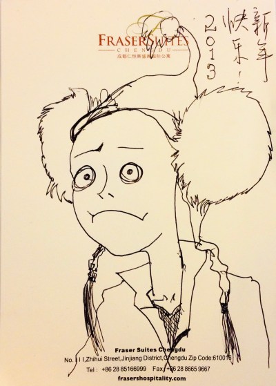 There was a face scrawled on the hotel stationery.