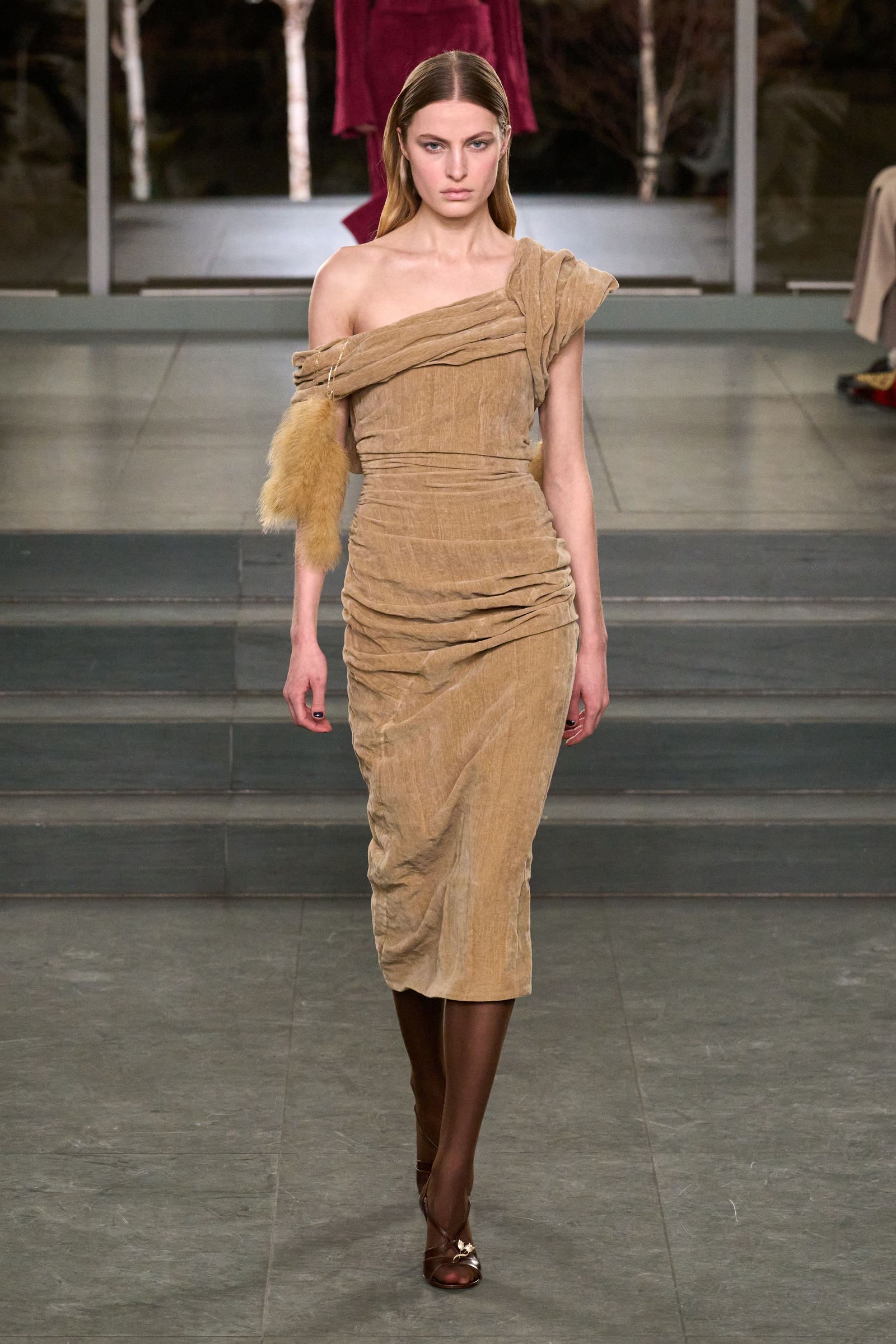 Image may contain fashionable adult clothing, gowns, formalwear and runway