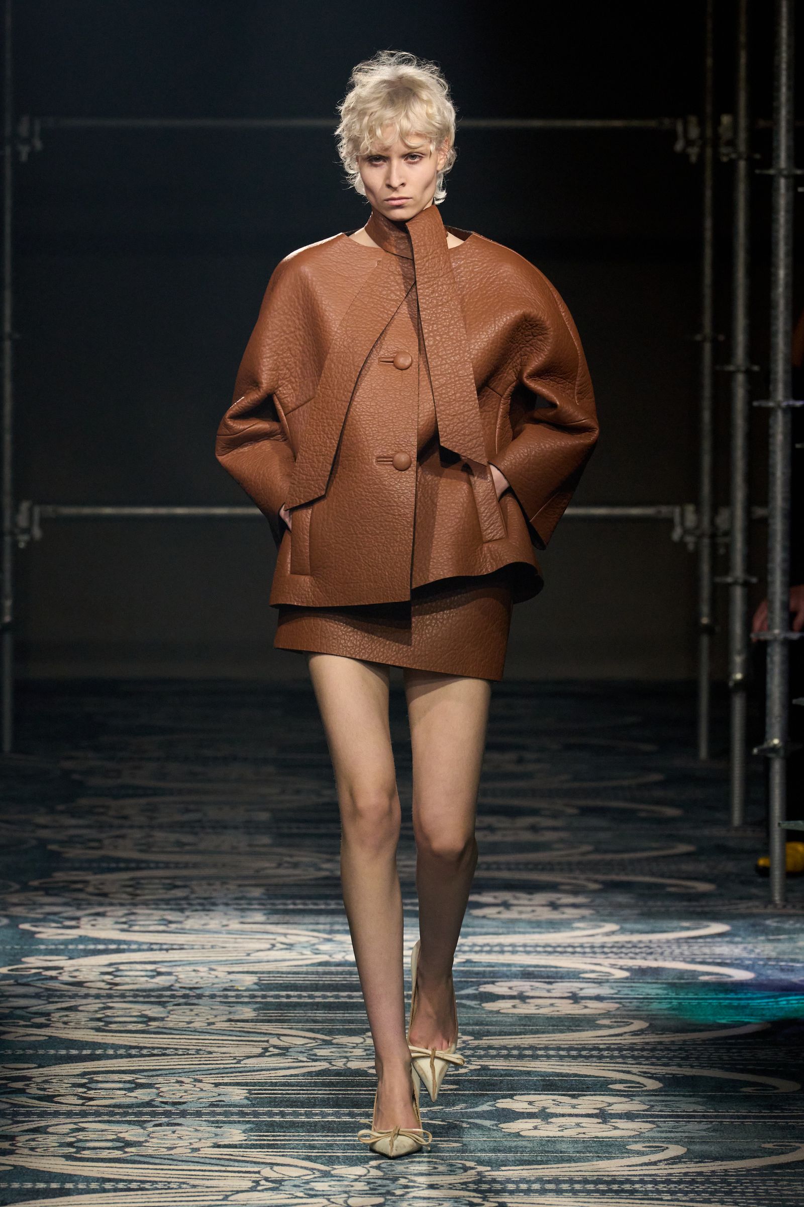 Image may contain Diane McBain adult clothing, outerwear, footwear, heels and fashion