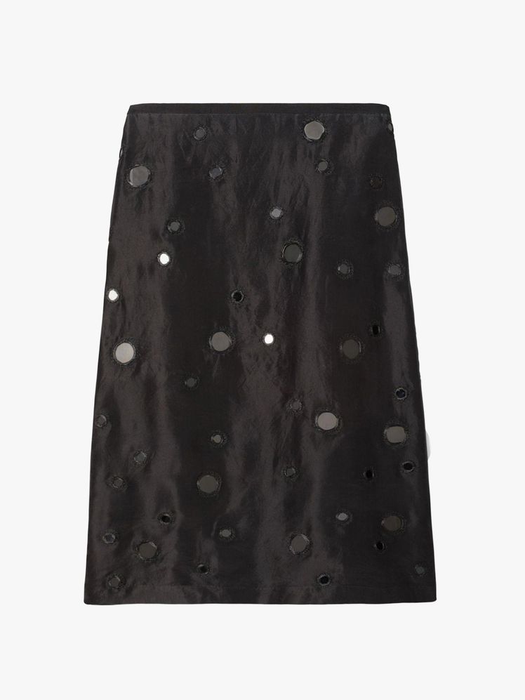 Image may contain: clothes, skirt, coat and home decor