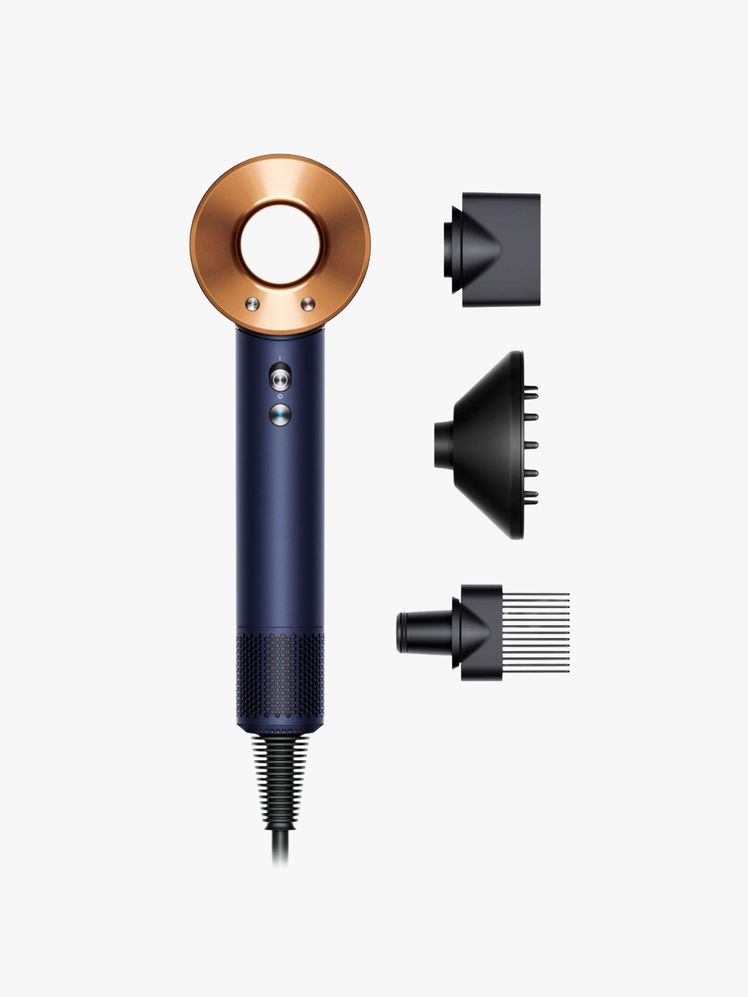 Image may contain: electrical equipment, microphone, lamp and traffic light