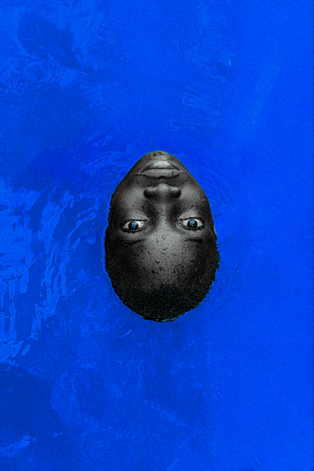 Image may contain faces, heads, people photography, portraits, leisure activities, sports, swimming, water and water sports