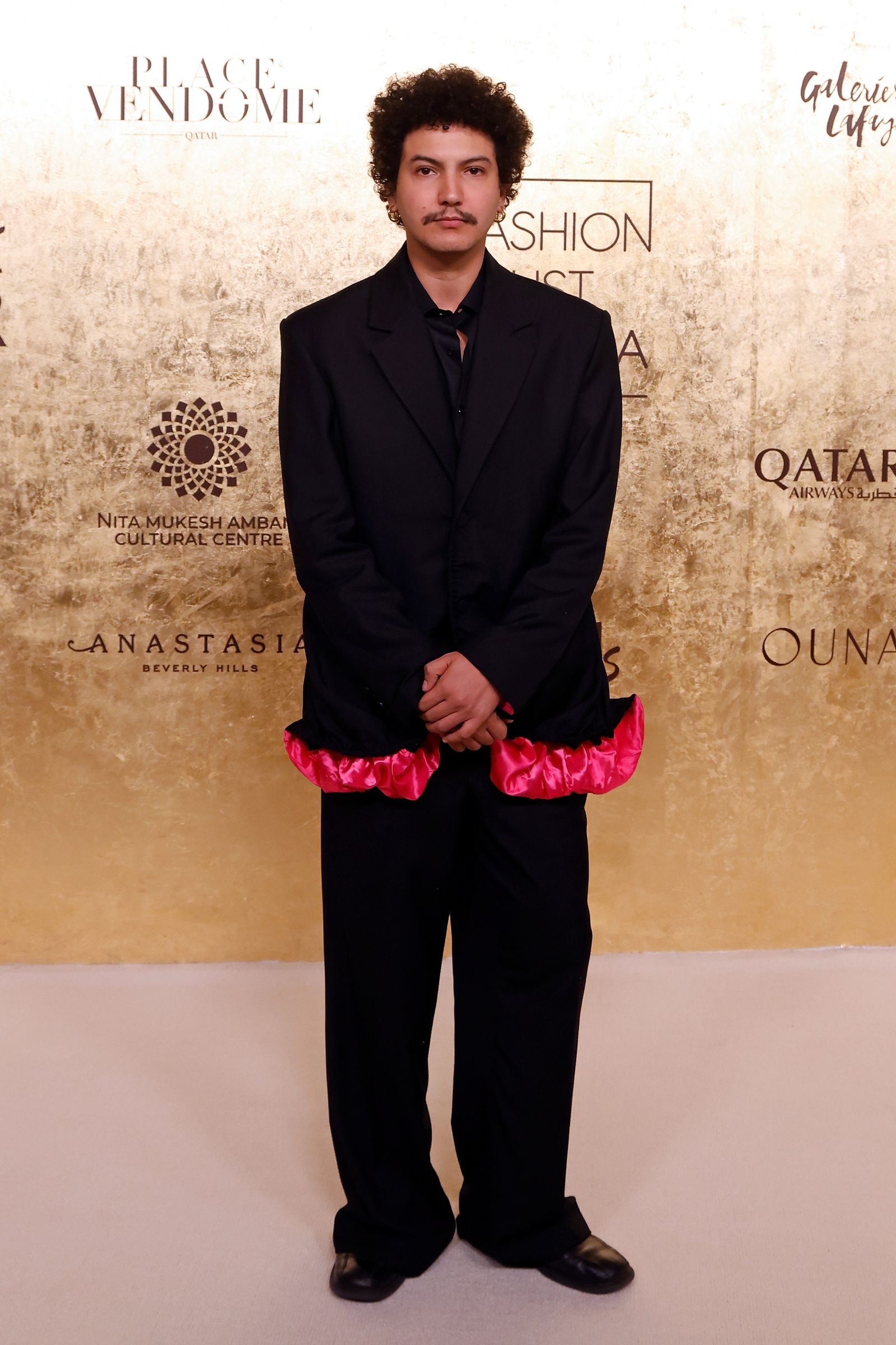 Image may contain clothing formal blazer blazer blazer adult fashion accessories face and head