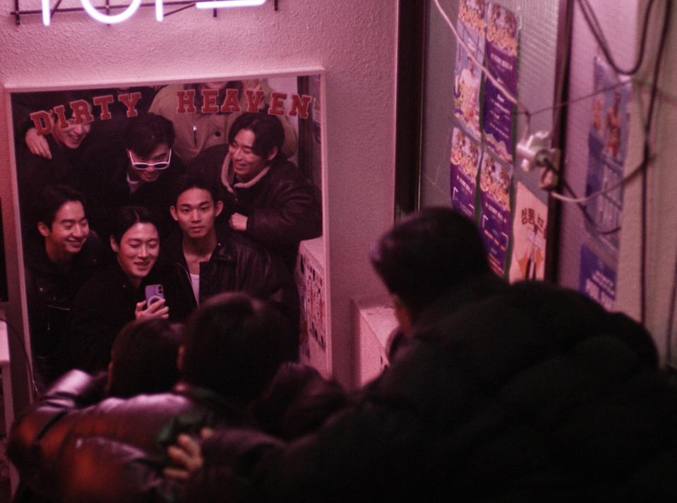 A group of men enter a nightclub in Seoul/