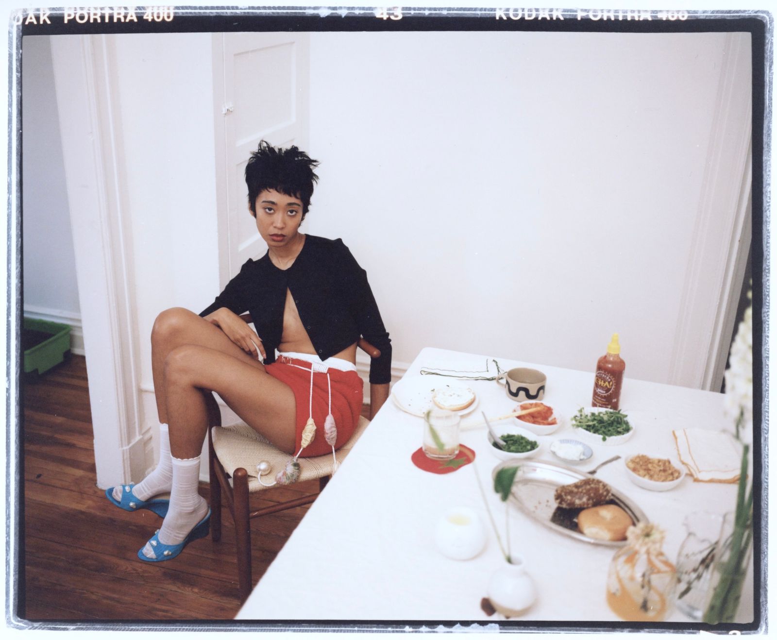 Image may contain dining table, furniture, table, building, architecture, restaurant, indoor, people and teenagers