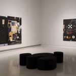 There are two abstract paintings in the gallery.