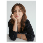 Portrait of a young woman with long brown hair.