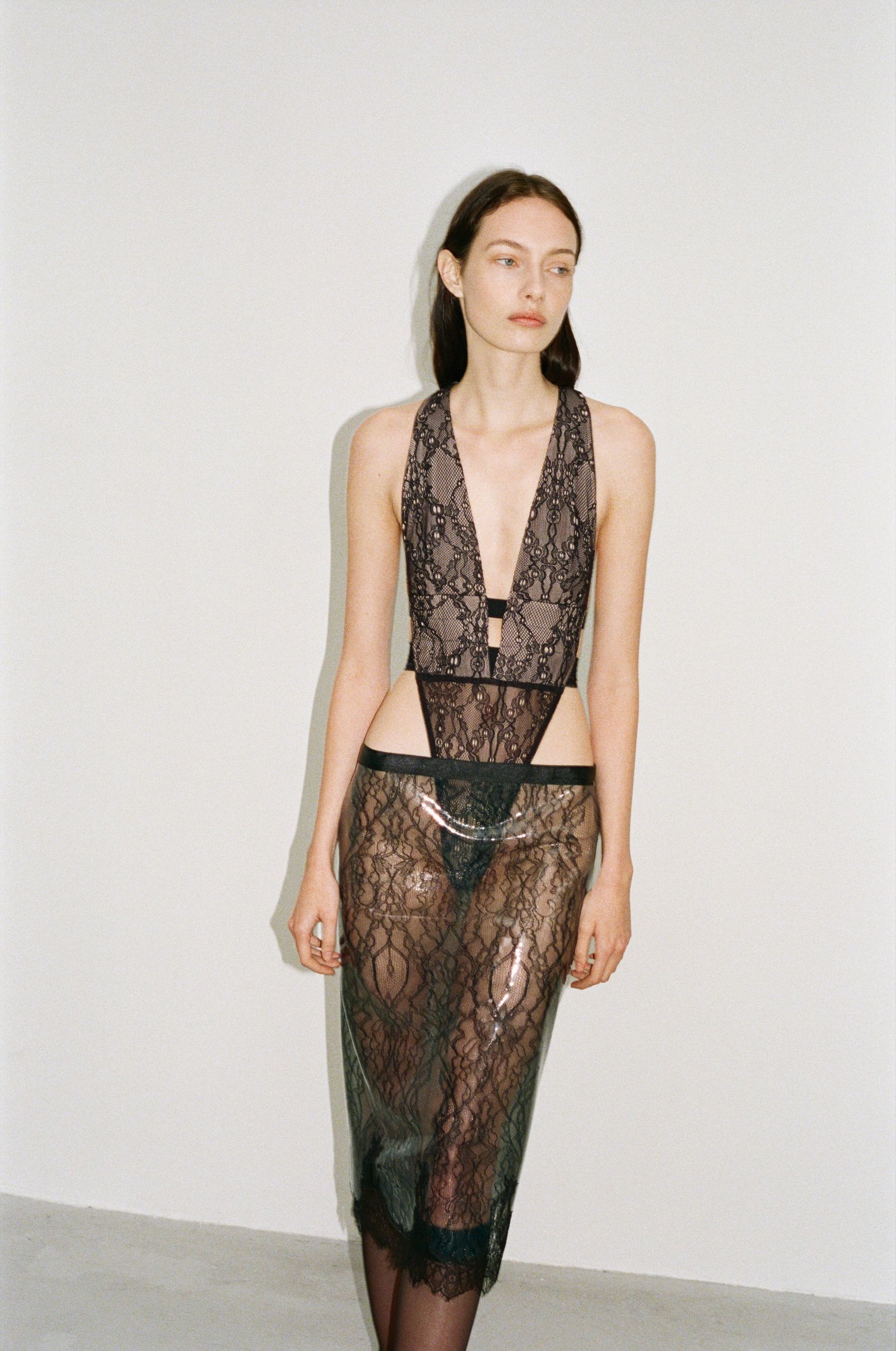 Images may contain Karmen Pedaru adult shirts, clothing, skin, tattoos, face and head