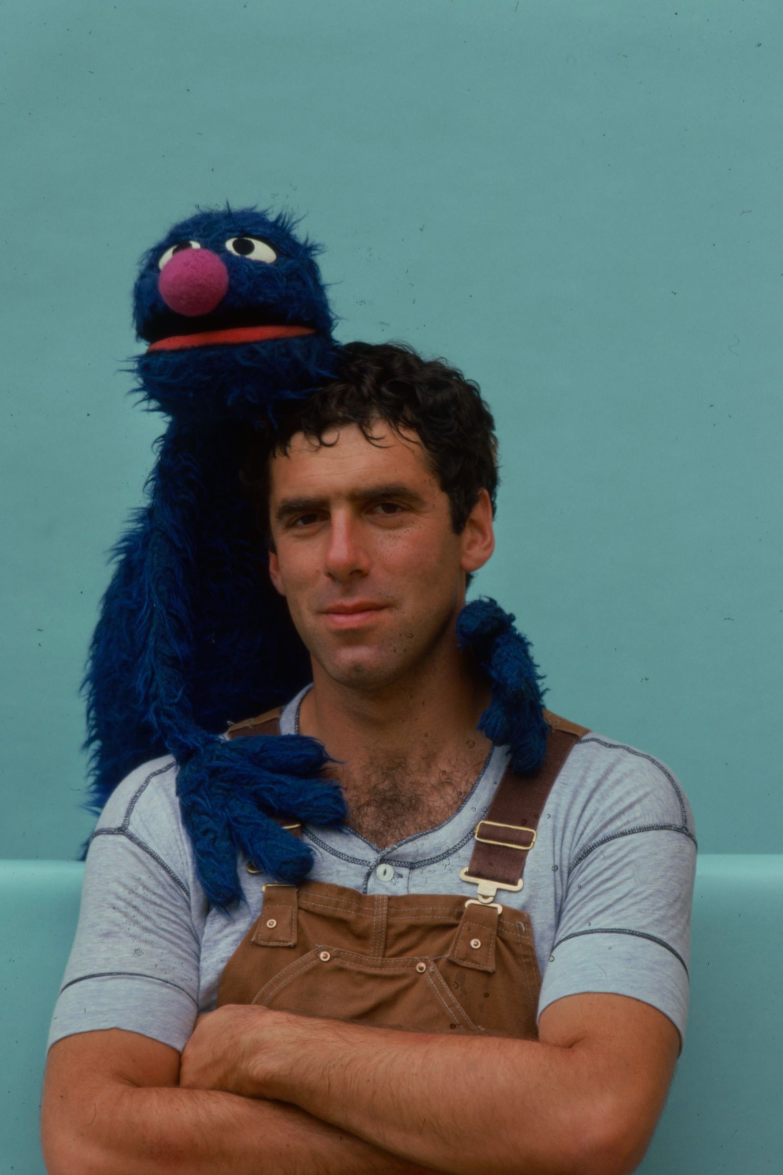 Image may contain Elliott Gould adults, clothing, gloves, face, head, photography, portrait and hair