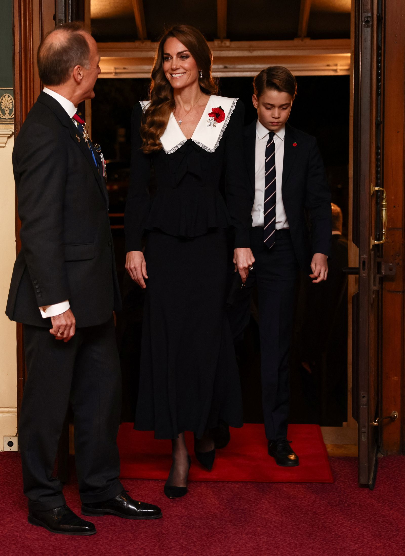 Britain's Catherine, Princess of Wales, and Prince George arrive at the Royal Albert Hall to join the Royal British Legion...