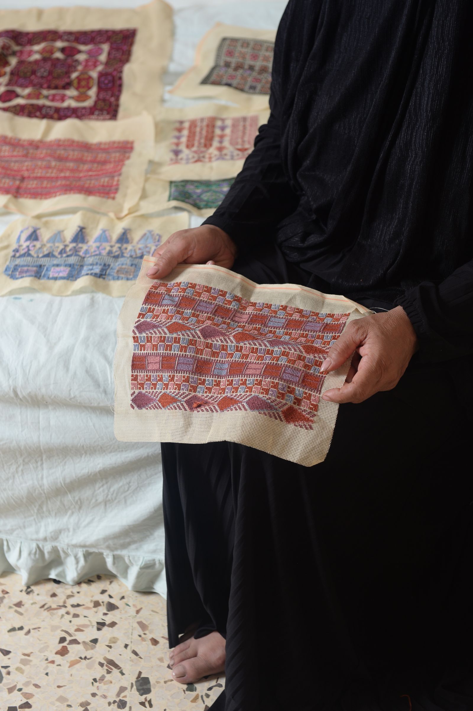 Image may contain adult home decor embroidery and patterns