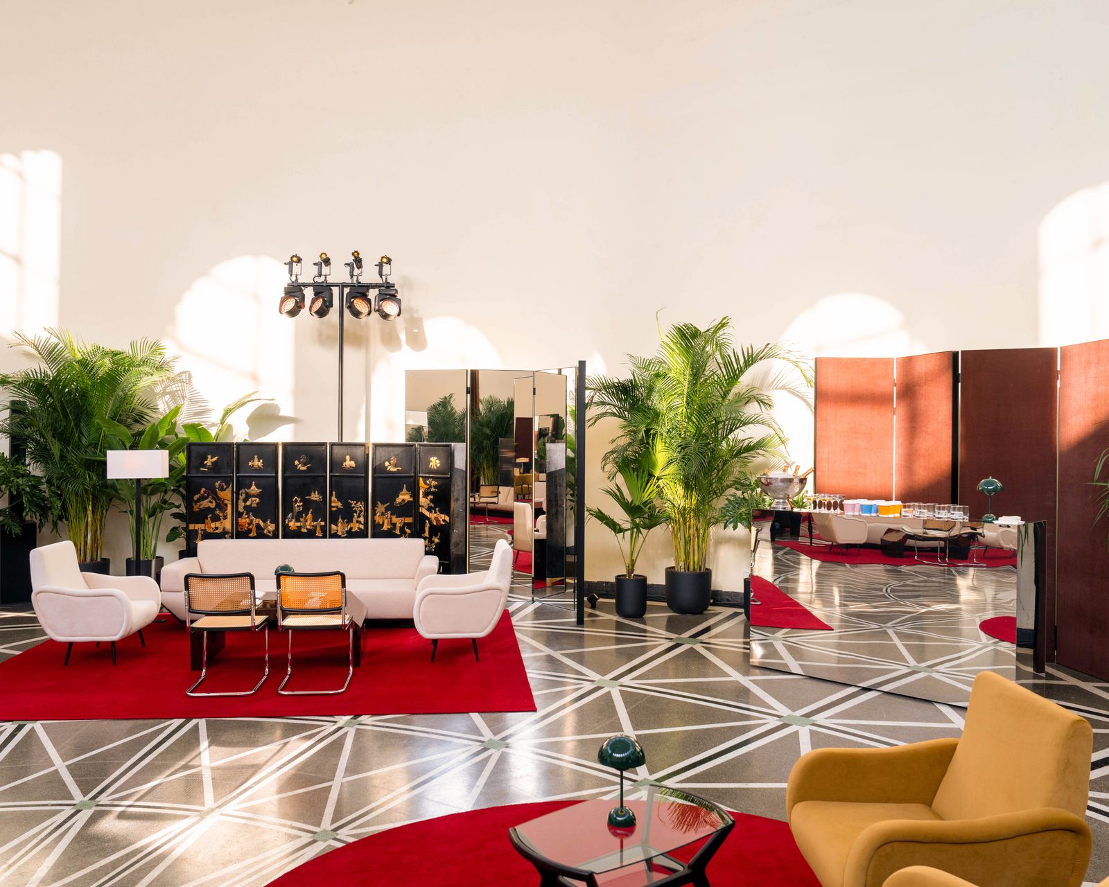 Image may contain interior architecture, architecture, foyer, plants, home decor, chairs and furniture