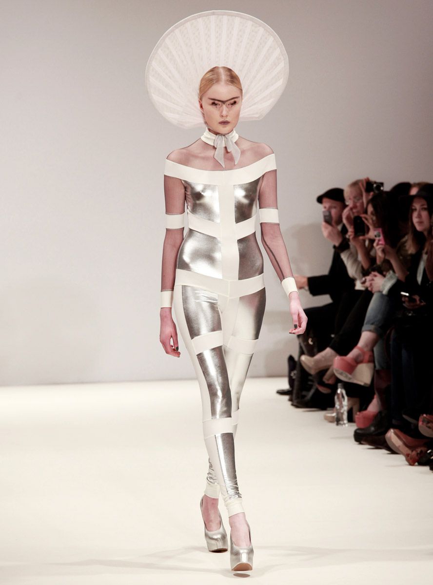 Image may contain clothing, people, dolls, toys and runways