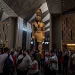 On November 8, 2025, crowds gathered around the huge statue of Ramses II in the entrance hall of the Grand Egyptian Museum in Giza, Egypt.
