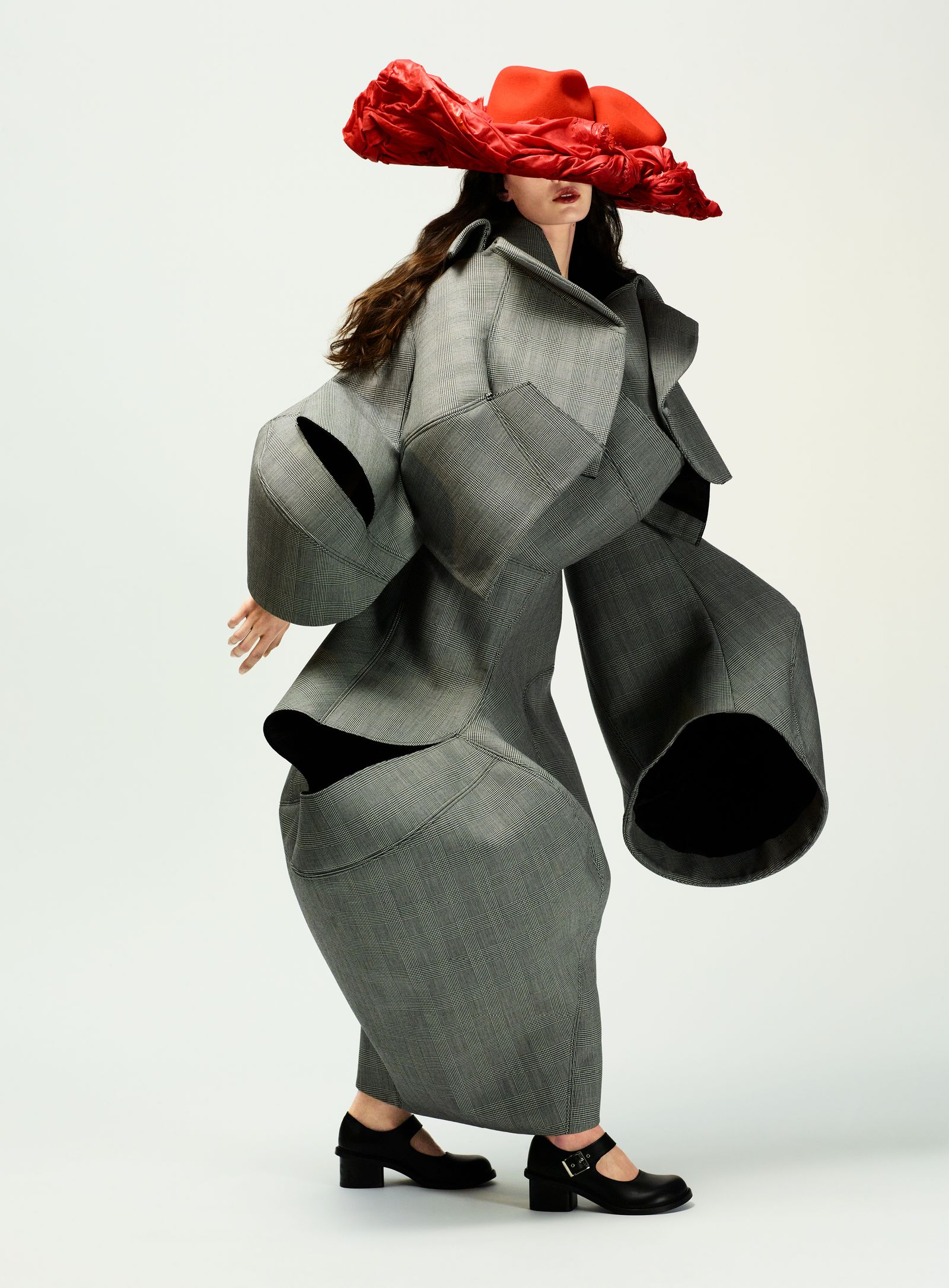 Image may contain formal, apparel, suits, adult, apparel, dresses, coats, hats, footwear, shoes, fashion and gowns