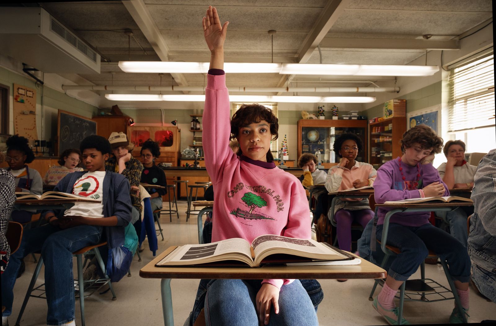 Image may contain Priah Ferguson Benjamin Pavard Adult Books Publications Furniture Table Faces and Heads