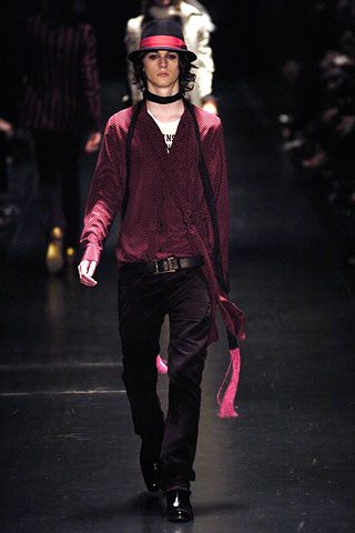 Image may contain runway fashion figures helmets apparel apparel and sleeves