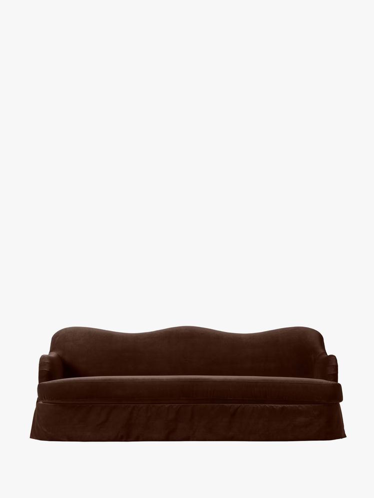 Image may contain: sofa, furniture, cushions, home decor and pillows