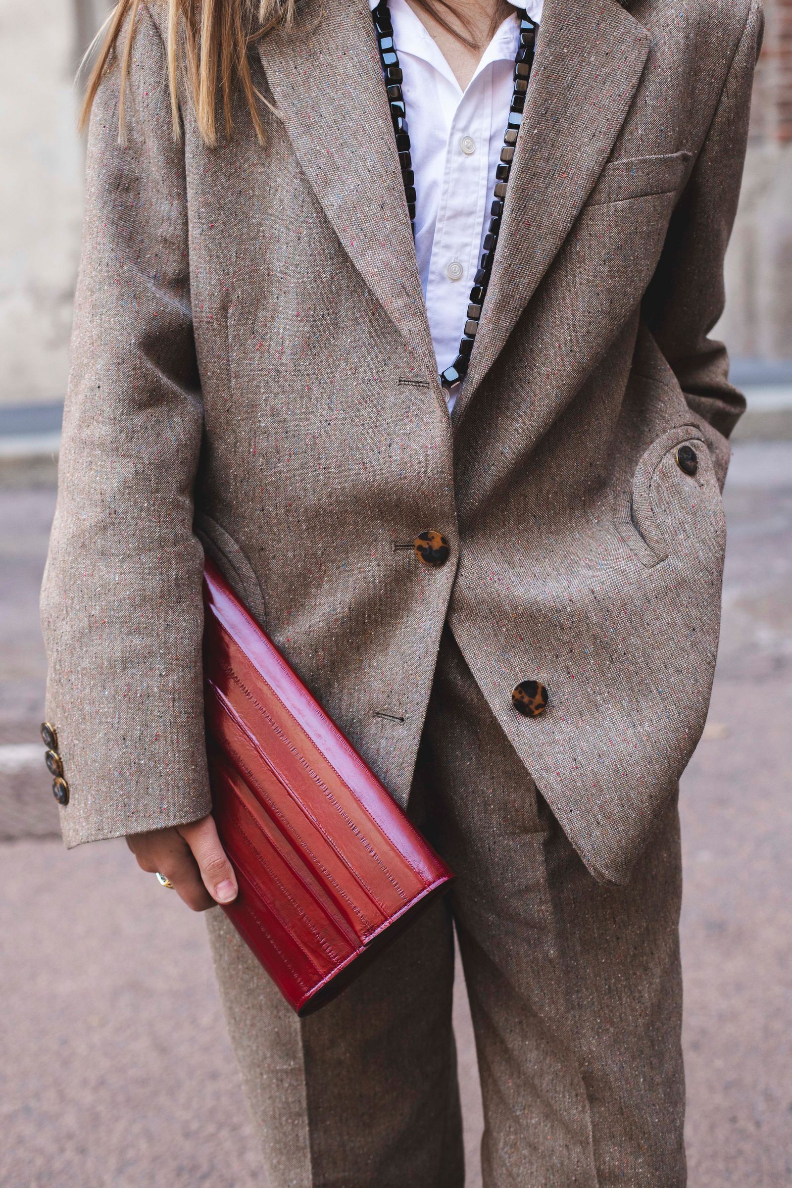 Image may contain blazers, coats, coats, coats and formal wear