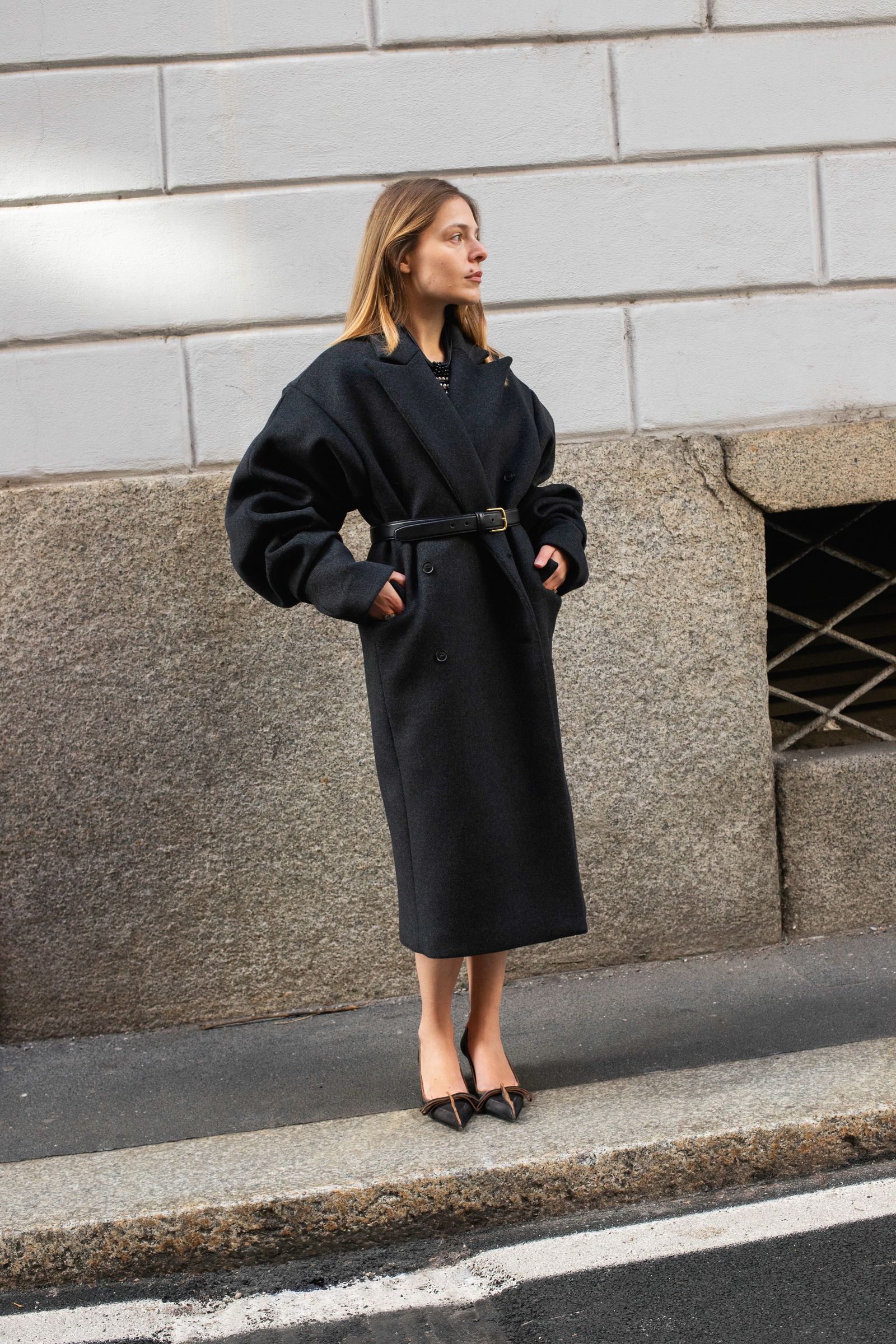 Image may contain clothing, outerwear, fashionistas, coats and robes