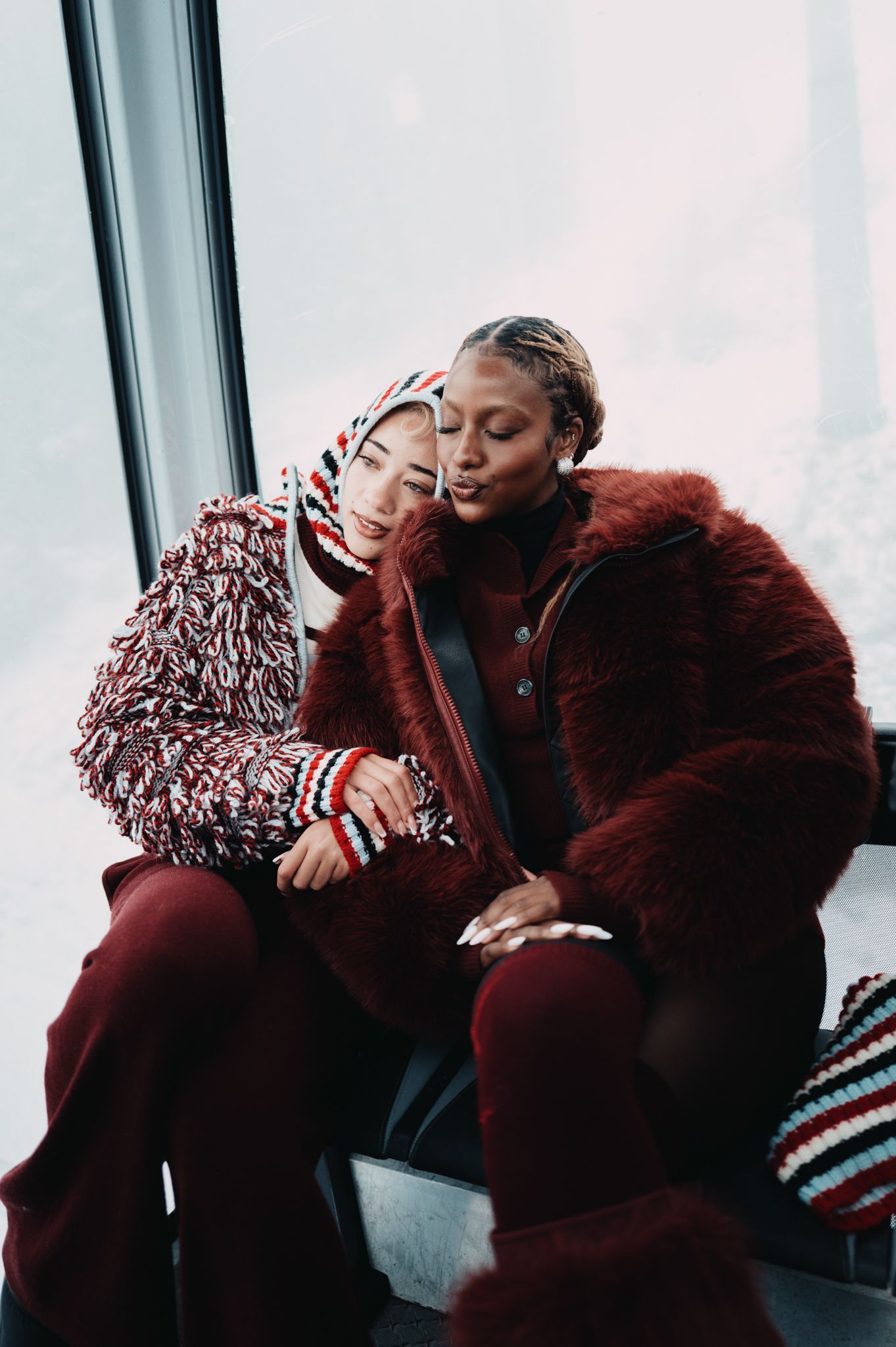 Image may contain Justine Skye Clothing Coat Adult Person Jacket Head Face Happy Smile and skating