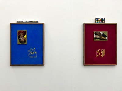 Two paintings, each with a solid color background—royal blue, burgundy—feature schematic representations of dice and collaged details of two hands.