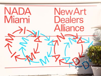 Signs reading NADA Miami and the New Art Dealers Alliance.