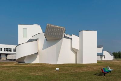 A white building composed of many uniformly shaped objects.