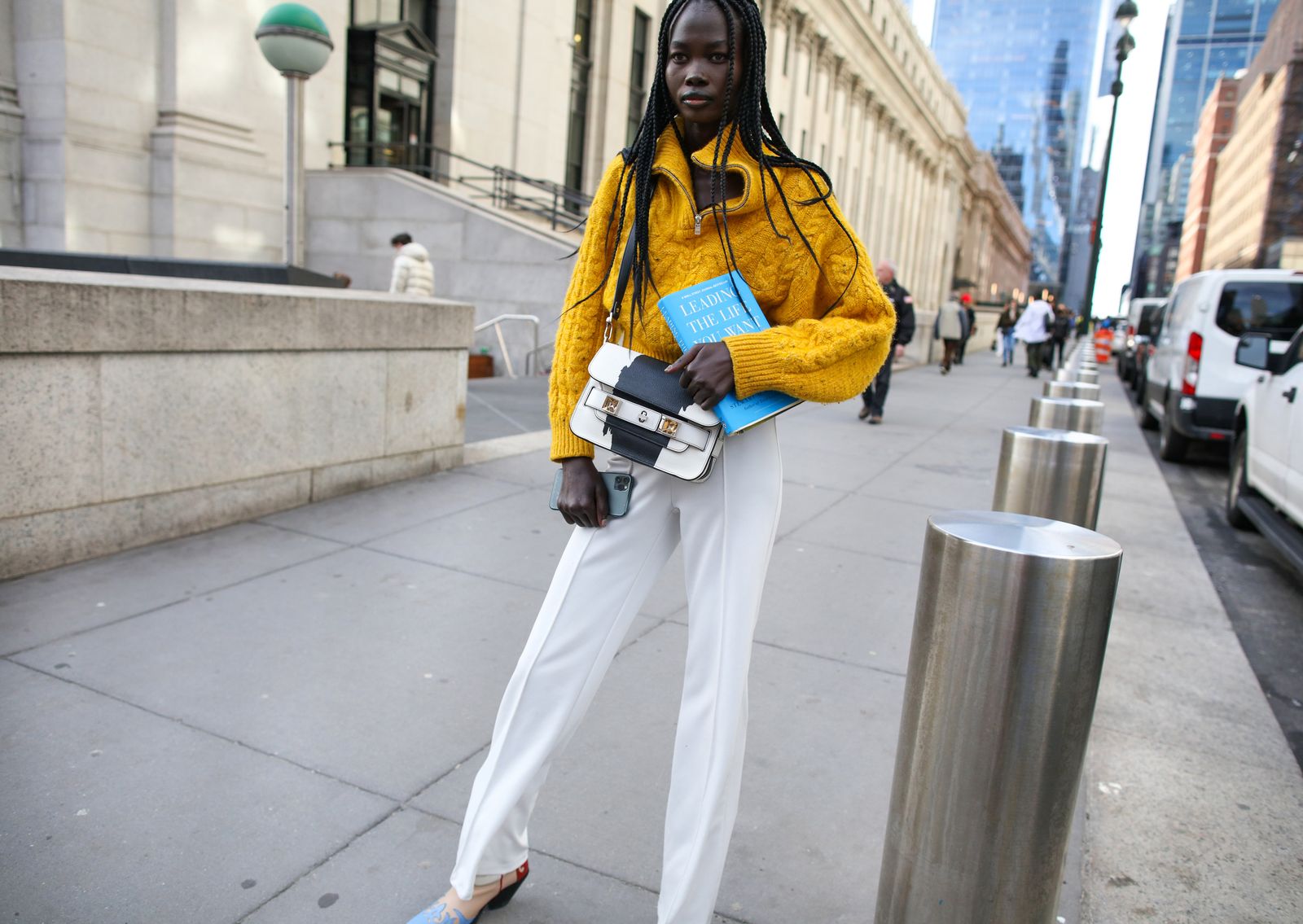 Image may contain clothing, apparel, footwear, people, vehicles, traffic, cars and outerwear