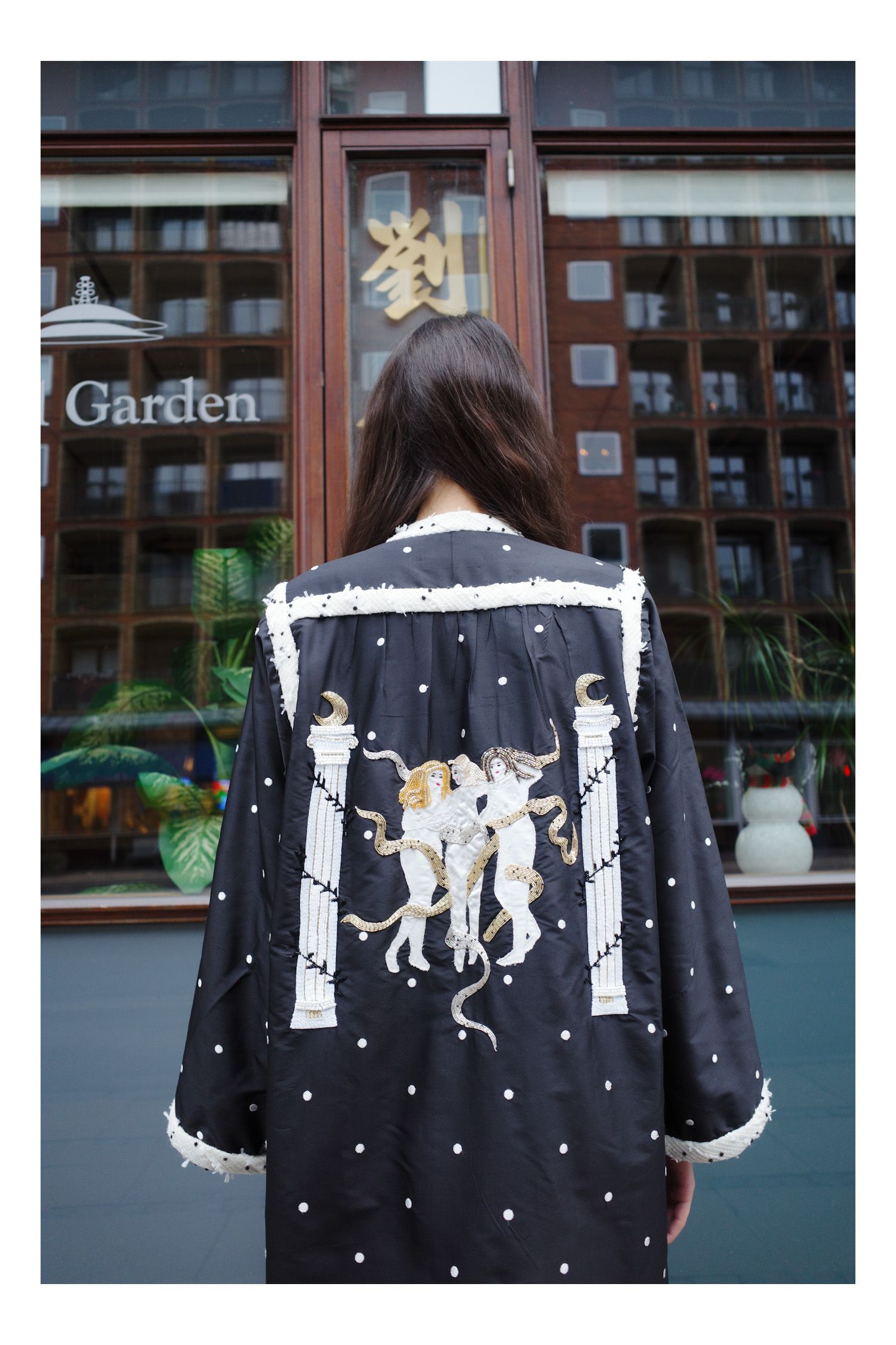 Pictures may contain clothing, dresses, fashion coats, formal dresses, long sleeve robes for adults and jackets