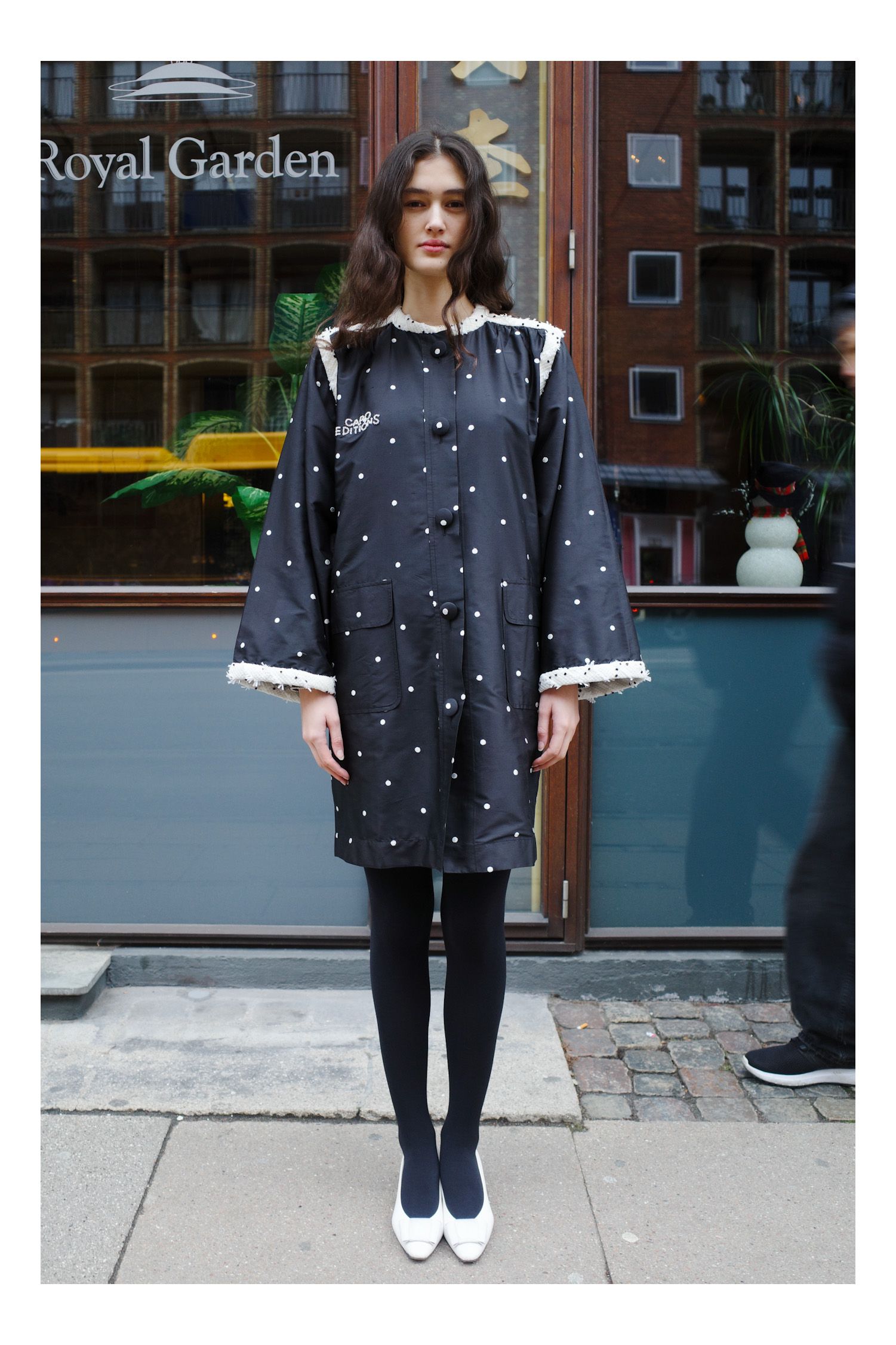 Image may contain clothing, coats, dresses and teenagers